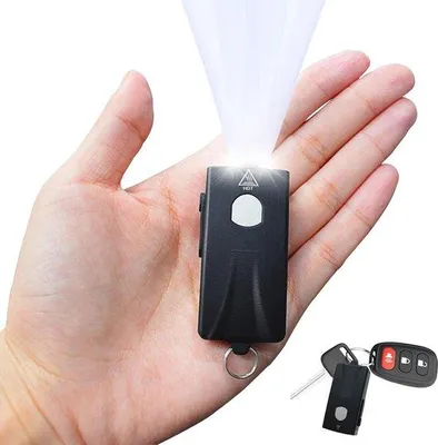 Immagine prodotto di Mini torcia LED ricaricabile con luminosità regolabile - Torcia LED portatile per attività all'aperto e situazioni di emergenza