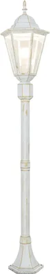 A white and gold outdoor lamp.
