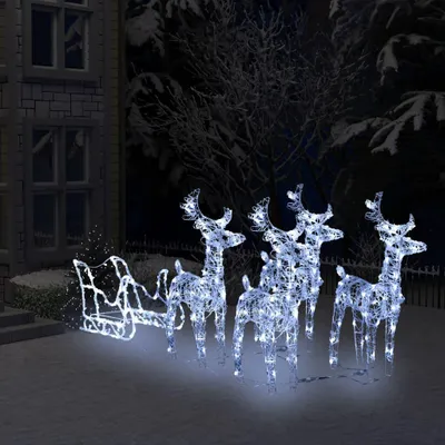 A nighttime outdoor scene with illuminated Christmas decorations.