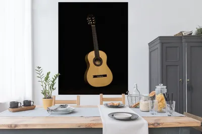 Produktbild von MuchoWow® Poster Vorderansicht einer akustischen Gitarre auf schwarzem Hintergrund 120x160 cm - Wandbilder