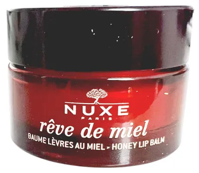 Zdjęcie produktu dla NUXE 3264680015809, Balsam do ust, Bezbarwny, Kobiety, Bardzo sucha skóra, Wosk pszczeli, Masło shea, Uspokajający, Odżywiający, Regeneracja
