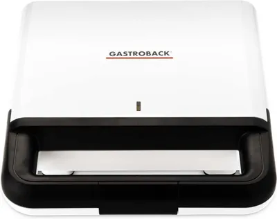 A close-up front view of a white sandwich maker with black accents.