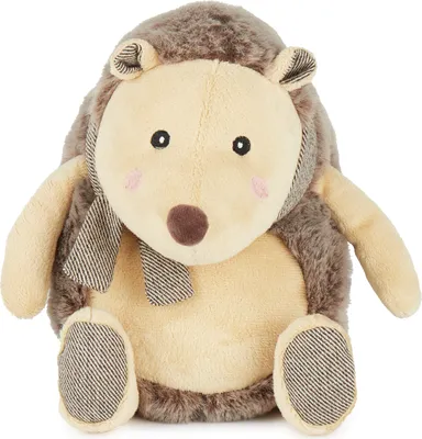 A plush hedgehog toy sitting on a white background.