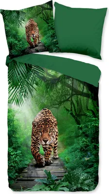 A duvet cover and pillow set with a jungle scene featuring a jaguar.