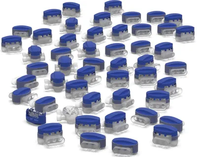 A collection of blue and clear wire connectors scattered on a white background.