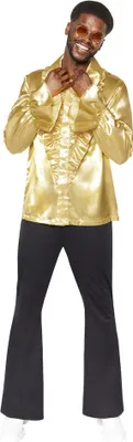 A man wearing a gold disco shirt and black bell-bottom pants.