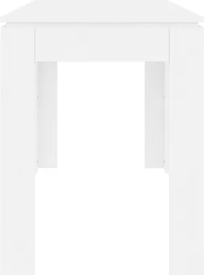 A white table viewed from the front, with a gap in the middle where legs would typically be.