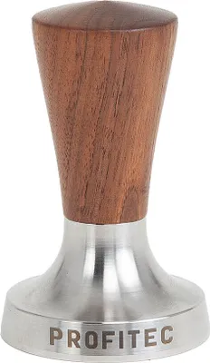 A close-up studio shot of a coffee tamper with a wooden handle and a silver base.