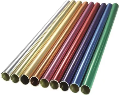 A collection of colored aluminum tubes arranged diagonally on a white background.