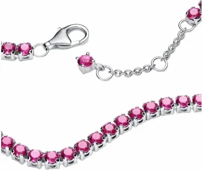 A close-up view of a silver tennis bracelet with pink stones, showing the clasp and a section of the chain.