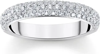 A close-up studio shot of a diamond ring on a white background.
