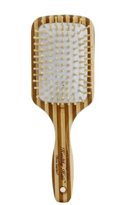 A top-down view of a wooden hairbrush against a white background.