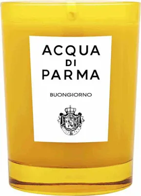 A yellow candle with a white label.