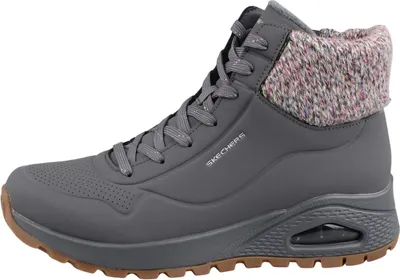 A side view of a gray Skechers boot with a knitted cuff.