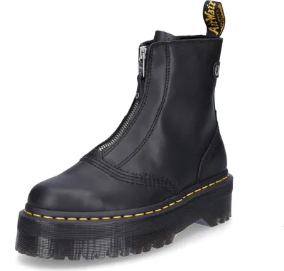 A black Dr. Martens boot with a front zipper and platform sole, shown from a three-quarter angle against a white background.