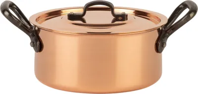 A copper pot with black handles and a lid, shown from the front on a white background.