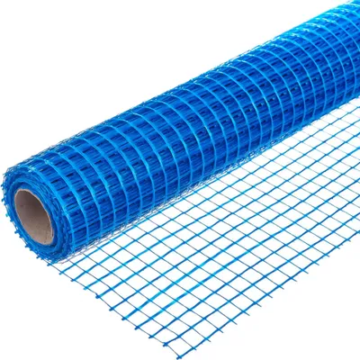 A roll of blue mesh material on a white background.