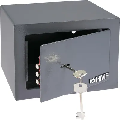 A small gray safe with its door open and a key inserted.