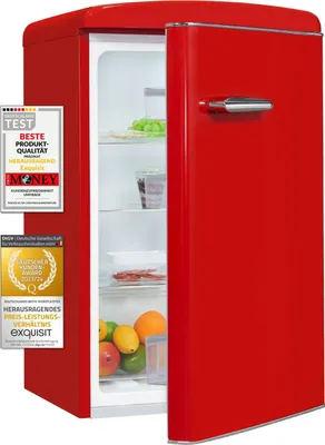 A red retro-style refrigerator with its door ajar, displaying fruit and other items inside.