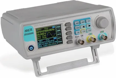A DDS signal generator and counter device with a digital display and various buttons and connectors.