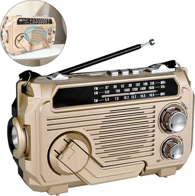 A gold and black portable radio with an antenna and a flashlight on the side.