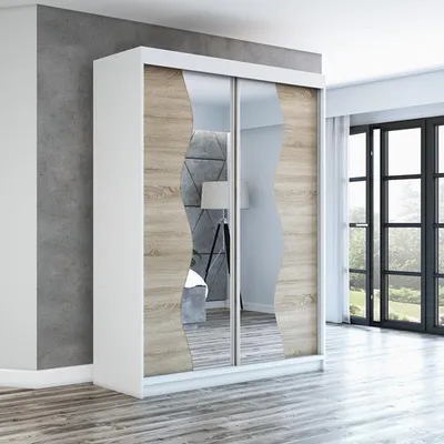 A modern sliding door wardrobe with mirrored panels and wood-effect accents, set against a grey wall and wooden floor in a room with large windows.