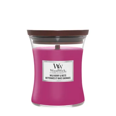 A WoodWick Wild Berry & Beets scented candle in a glass jar with a wooden lid, presented on a white background.