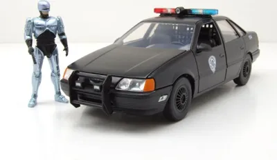 Produktbild von Jada Toys 253255060 Ford Taurus Police 1986 schwarz RoboCop mit Figur 1:24
