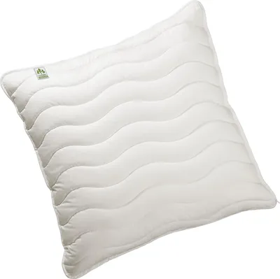 A white pillow with a wavy quilted pattern, shown at an angle against a white background.