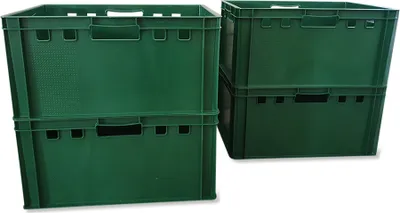 Two stacks of green plastic crates against a white background.