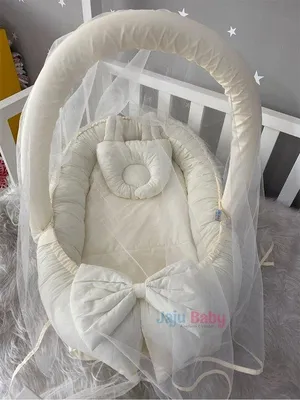 Produktbild von Jaju Baby Babynest mit Kissen und Moskitonetz, Crème, 100 x 60 cm