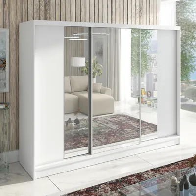 A white sliding door wardrobe with mirrored doors, reflecting a living room interior.