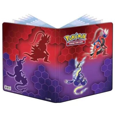 An open Pokémon trading card portfolio featuring Koraidon and Miraidon.