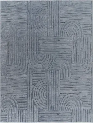 A close-up, top-down view of a gray rug with a geometric pattern.