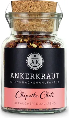 A glass jar of Chipotle Chili spice with a cork lid and a label.