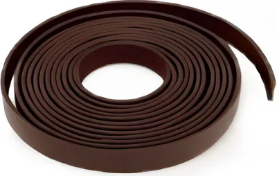 A coiled strip of brown material, likely a furniture edge banding, on a white background.