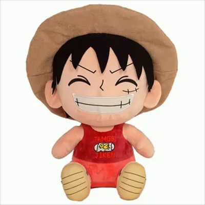 A plush toy of the character Ruffy from One Piece, sitting down.