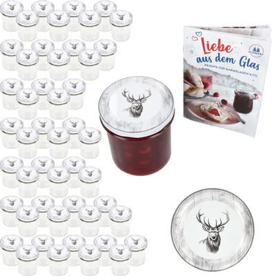 A collection of empty jars with decorative lids, a filled jar, a recipe book, and a decorative plate, all featuring a deer motif.