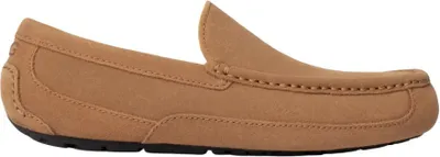 A side view of a single brown Ugg Ascot loafer.
