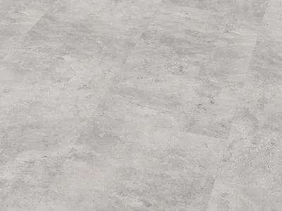 A close-up, overhead view of a tiled floor with a concrete-like pattern.
