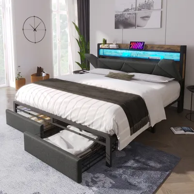 A bedroom scene featuring a bed with storage and LED lighting.