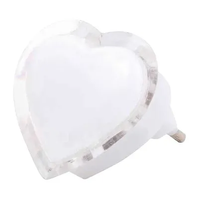 A heart-shaped LED night light plugged into an electrical socket.