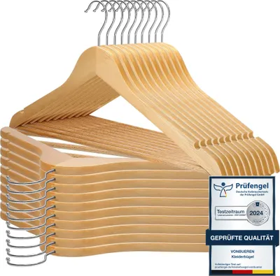 A stack of wooden clothes hangers with a certification badge.