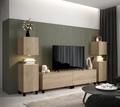 A modern living room with a wall-mounted entertainment unit and TV.
