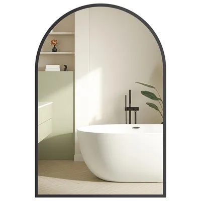 A reflection of a modern bathroom with a bathtub and vanity.