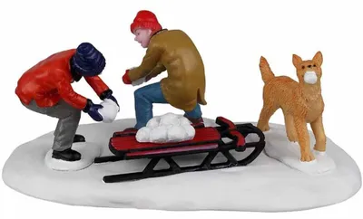 Miniatur Schneebedeckte Munitionsoperation für Weihnachtsdorf