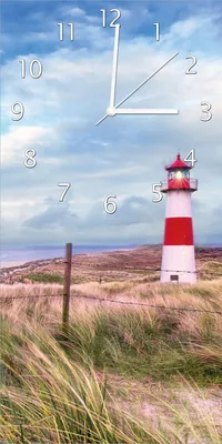 Produktbild von Wallario Design Wanduhr bedruckt, Größe 30 x 60 cm, Motiv: Leuchtturm am Strand von Sylt