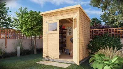 A wooden garden shed is shown in a backyard setting with a fence, trees, and plants.