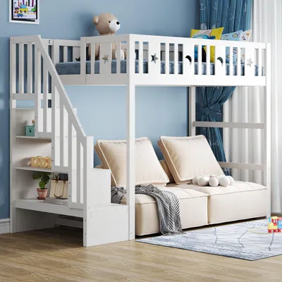 A white bunk bed with a sofa underneath, set in a child's bedroom with blue walls and curtains.