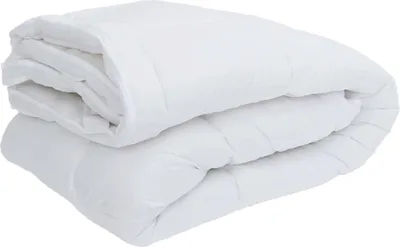 A white mattress protector is folded and stacked on a white background.